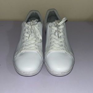 White size 9 women’s Lacoste leather sneakers
